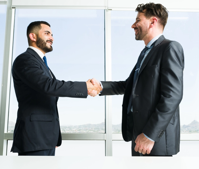 building-collaborative-teamwork-handsome-businessman-business-executive-getting-know-each-other-while-shaking-hands-work-meeting